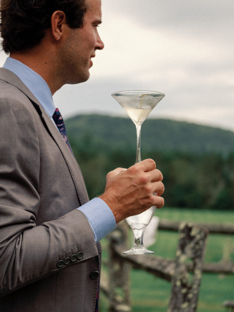 A new meaning to double fisting, captured by Kay Cushman, a wedding photographer in Vermont.
