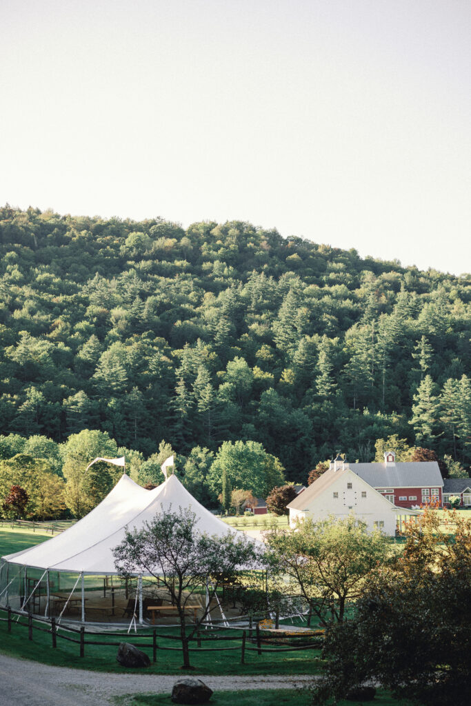 Riverside Farm wedding with tent and barn nestled in the mountains of Vermont.
