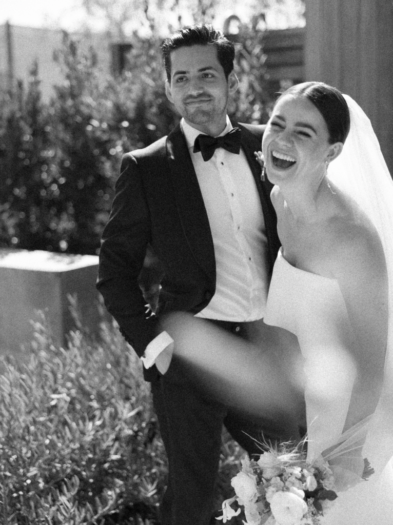Fun, candid laughter of this Stanley Ranch wedding on black and white film by editorial wedding photographer, Kay Cushman.