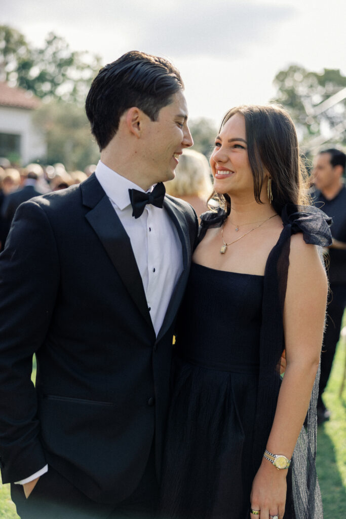 Wedding photos at the Inn at Rancho Santa Fe feature guests in black tie attire during the event's cocktail hour.