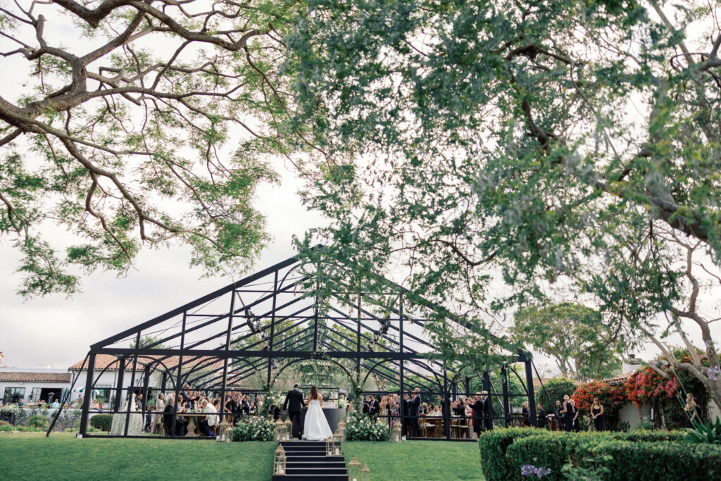 greenhouse frame wedding reception on the lawn of the Inn at Rancho Santa Fe.